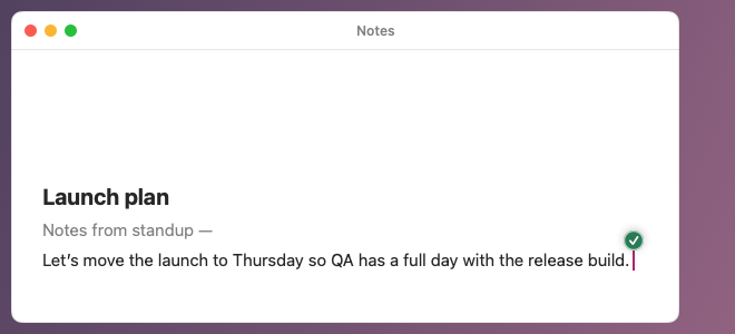 The same sentence typed into Notes, with a small green tick at the cursor